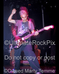 Photo of Daron Malakian of System of a Down in concert in 1998 by Marty Temme