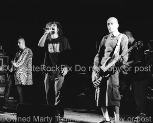 Photo of Serj Tankian and Shavo Odadjian of System of a Down in concert by Marty Temme