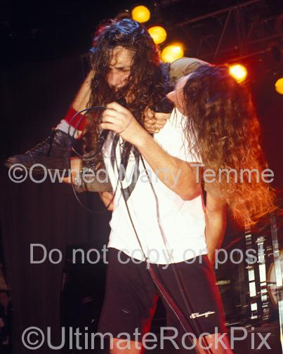 Photos of Chris Cornell Carrying Eddie Vedder on His Shoulders During a Temple of the Dog Show in 1991 by Marty Temme