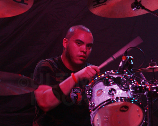 Photo of drummer Brian Vodinh of 10 Years in concert by Marty Temme