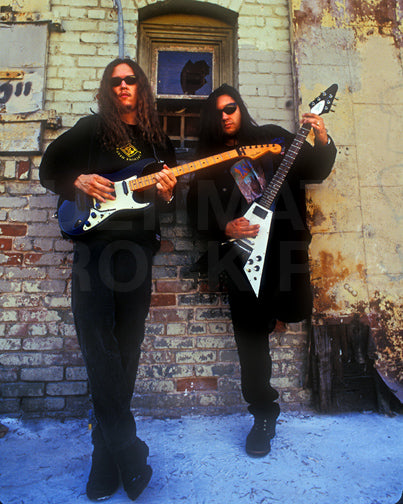 Photo of James Murphy and Eric Peterson of Testament during a photo shoot in 1994 by Marty Temme