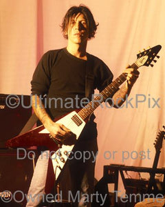 Photos of Tracii Guns of L.A. Guns Playing a Gibson Flying V During a Photo Shoot in 1995 by Marty Temme