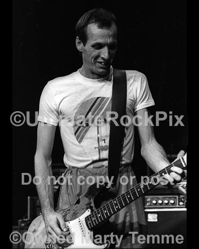 Photo of guitar player Adrian Belew of Talking Heads in concert in 1979 by Marty Temme