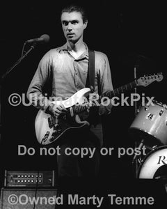 Photo of David Byrne of Talking Heads performing onstage in 1979 by Marty Temme