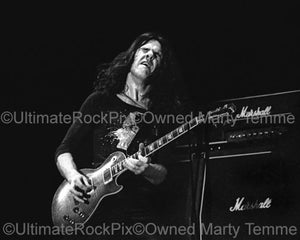 Photos of Guitarist Gary Moore of Thin Lizzy in Concert in 1977 by Marty Temme