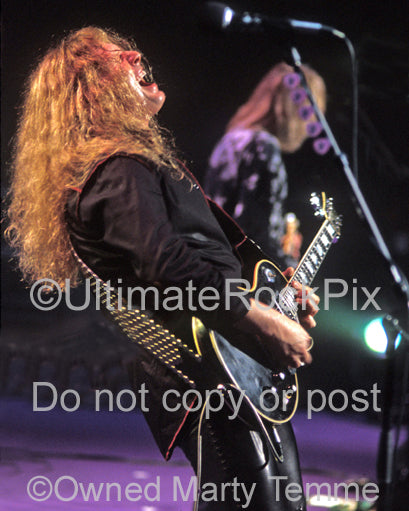Photo of John Sykes of Thin Lizzy in onstage in 2004 by Marty Temme