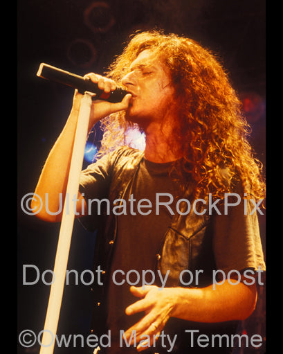 Photo of vocalist Danny Bowes of Thunder in concert in 1991 by Marty Temme