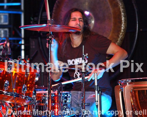 Photo of drummer Brian Tichy in concert in 2010 by Marty Temme