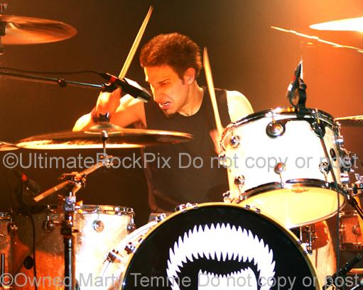 Photo of drummer Brian Tichy of Billy Idol in concert in 2005 by Marty Temme