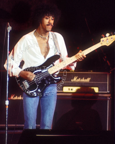 Photos of Phil Lynott of Thin Lizzy in Concert in 1977 by Marty Temme ...