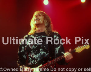 Photo of guitarist Scott Gorham of Thin Lizzy in concert in 2004 by Marty Temme