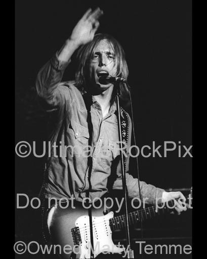 Photos of Musician Tom Petty Playing a Fender Stratocaster in Concert in 1978 by Marty Temme