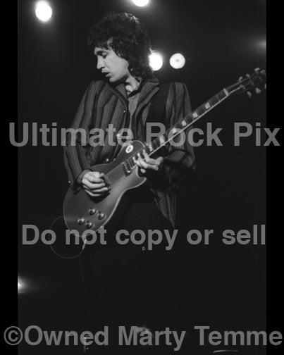 Photo of Mike Campbell of Tom Petty in concert in 1980 by Marty Temme