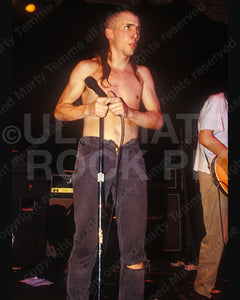Photo of Maynard James Keenan of Tool in concert in 1991 by Marty Temme
