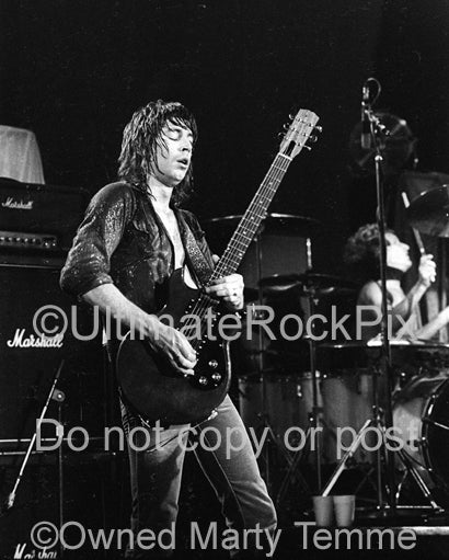 Photo of Pat Travers playing a Gibson Melody Maker in concert 1979 by Marty Temme
