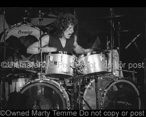 Photo of drummer Tommy Aldridge of Pat Travers in concert in 1979 by Marty Temme