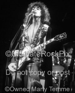 Black and white photo of Marc Bolan of T. Rex in concert in 1973 by Marty Temme