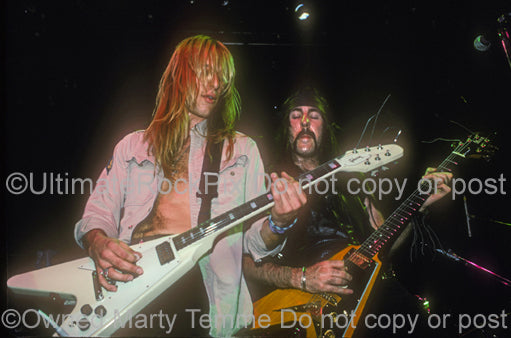 Photo of guitarists Bruce Franklin and Rick Wartell of Trouble in concert by Marty Temme