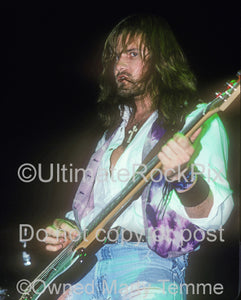 Photo of bass player Ron Holzner of Trouble in concert in 1990 by Marty Temme
