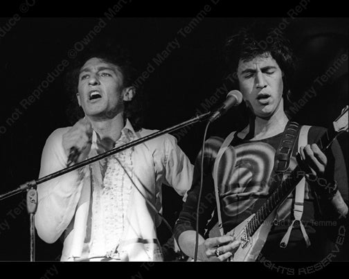 Photo of Fee Waybill and Bill Spooner of The Tubes in concert in 1975 by Marty Temme