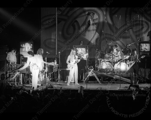 Photo of Fee Waybill, Rick Anderson and Prairie Prince of The Tubes in concert in 1975 by Marty Temme