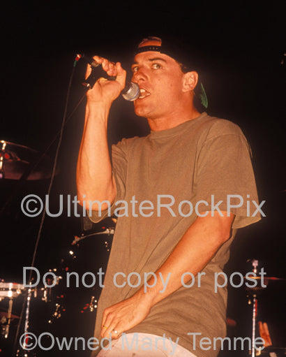 Photo of Whitfield Crane of Ugly Kid Joe in concert in 1992 by Marty Temme