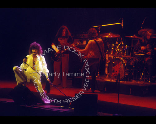 Photo of David Byron, Mick Box, John Wetton and Lee Kerslake of Uriah Heep in 1976 by Marty Temme