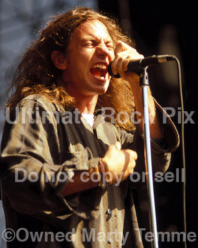 Photo of Eddie Vedder of Pearl Jam in concert in 1992 by Marty Temme