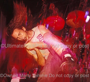 Photos of Eddie Vedder of Pearl Jam Performing Onstage in 1991 in Hollywood, California by Marty Temme