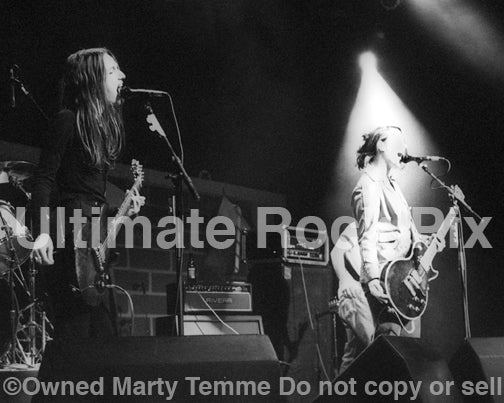 Photo of Nina Gordon and Louise Post of Veruca Salt in concert in 1994 by Marty Temme