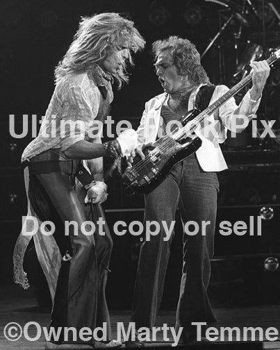 Photo of David Lee Roth and Mike Anthony of Van Halen in concert in 1979 by Marty Temme