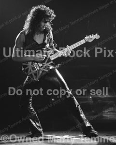 Photo of guitarist Eddie Van Halen of Van Halen in concert in 1979 by Marty Temme