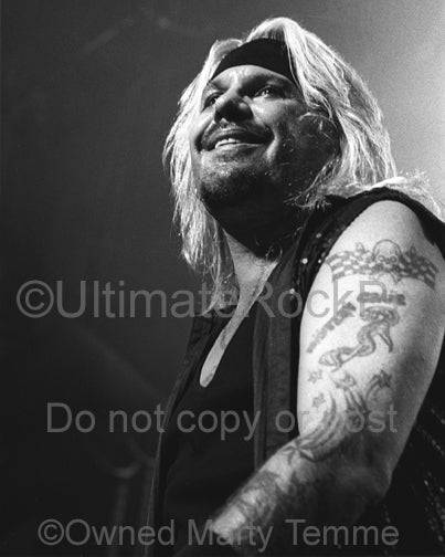 Black and white photo of Vince Neil of Motley Crue in concert by Marty Temme