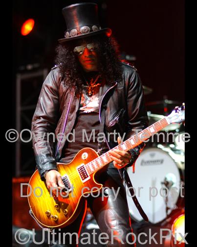 Photos of Slash of Velvet Revolver and Guns N' Roses Playing a Gibson Les Paul in Concert by Marty Temme