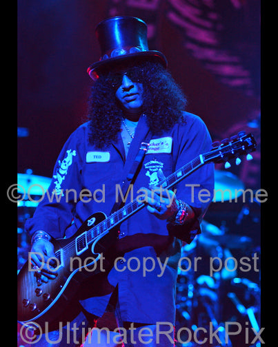 Photo of Slash playing a Les Paul in concert by Marty Temme