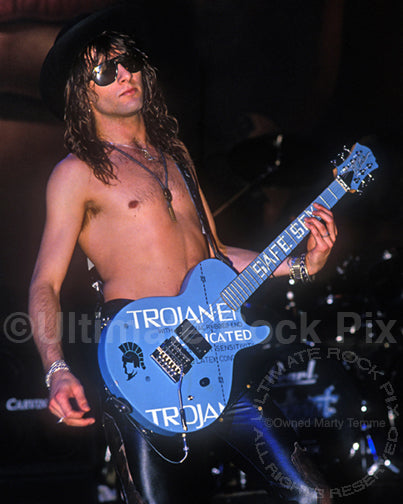 Photo of Erik Turner of Warrant in concert in 1989 by Marty Temme