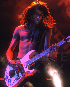 Photo of guitarist Erik Turner of Warrant in concert in 1989 by Marty Temme
