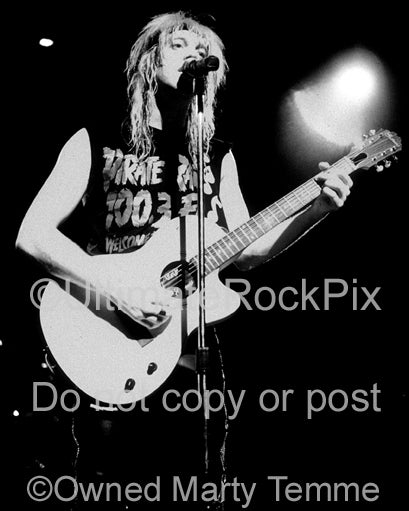 Black and white photo of Jani Lane of Warrant in concert in 1989 by Marty Temme