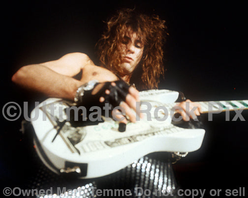 Photo of Erik Turner of Warrant in concert in 1988 by Marty Temme