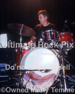 Photo of drummer Stephen Hodges of Mike Watt in concert in 1997 by Marty Temme