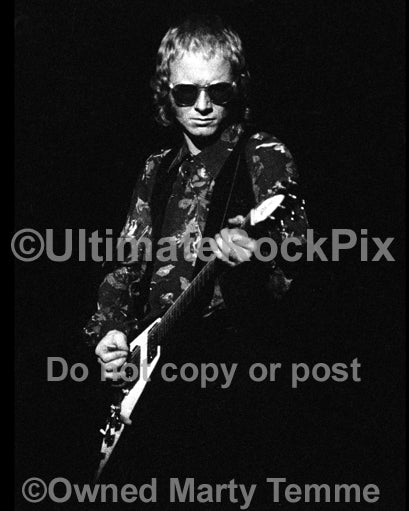 Photo of guitarist Andy Powell of Wishbone Ash in concert in 1974 by Marty Temme
