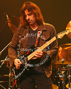 Photo of guitarist Warren DeMartini of Ratt onstage in 2008 by Marty Temme