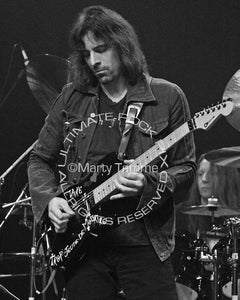 Black and white photo of Warren DeMartini of Ratt onstage in 2008 by Marty Temme