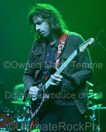Photo of guitarist Warren DeMartini of Ratt in concert in 2008 by Marty Temme