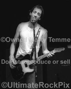 Photos of Pete Townshend of The Who Performing with a Bandaged Hand in Concert in 1980 by Marty Temme