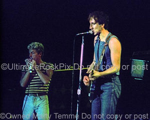 Photos of Pete Townshend and Roger Daltrey of The Who in Concert in 1982 by Marty Temme