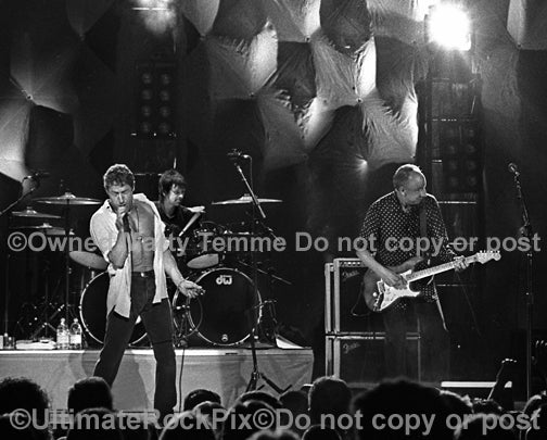 Black and white photo of Pete Townshend and Roger Daltrey of The Who in concert in 2000