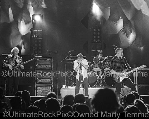 Photos of Pete Townshend, Roger Daltrey, John Entwistle and Zak Starkey of The Who in Concert in 2000 by Marty Temme