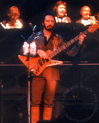 Photo of John Entwistle of The Who in concert in 1979 by Marty Temme