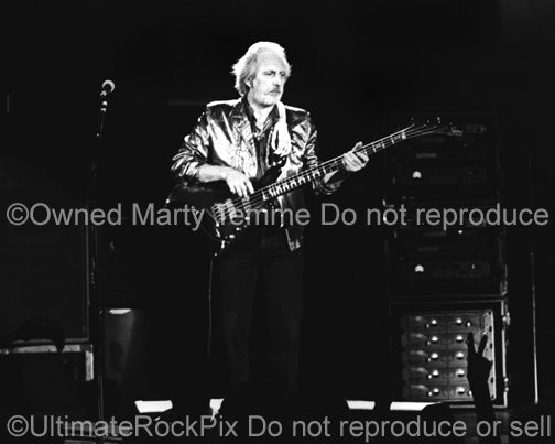 Photo of John Entwistle of The Who in concert in 2000 by Marty Temme